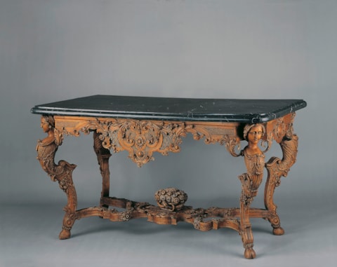 A German Regence finely carved walnut Console Table