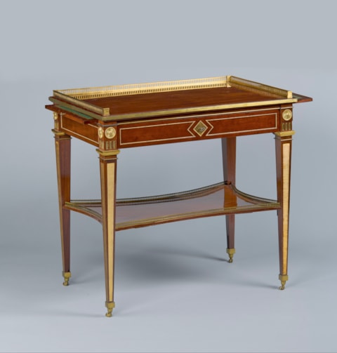 A German ormolu-mounted mahogany ‘tablé á écrire’