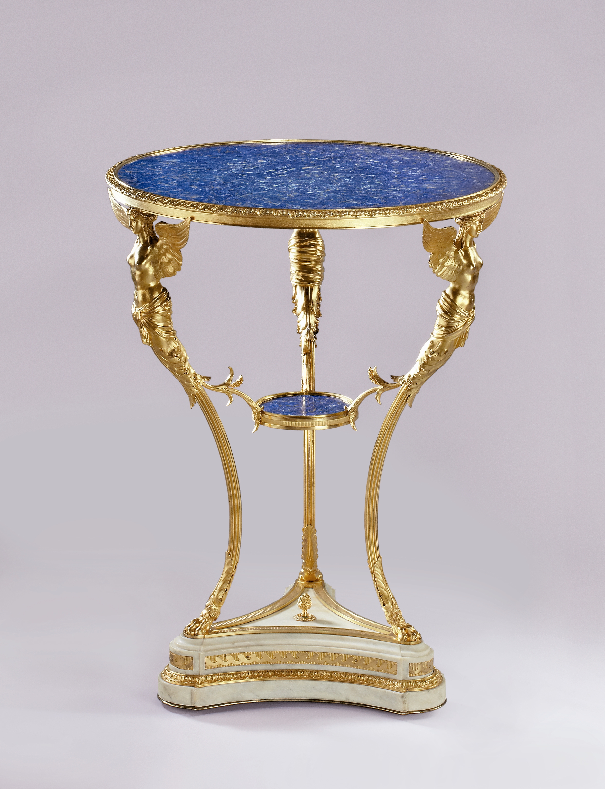 A Russian ormolu and lapislazuli Tripod Gueridon with caryatids