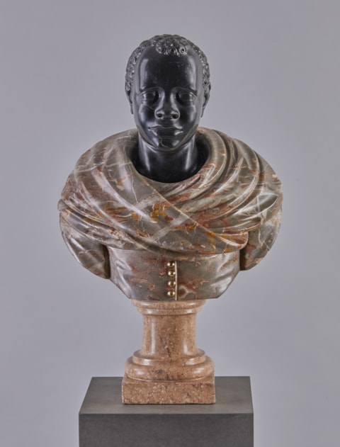 An Italian gilt bronze-mounted marble busts of a Venetian blackamoor