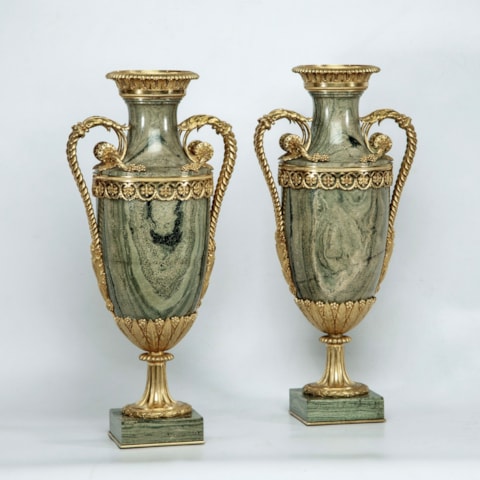 Pair of Louis XVI ormolu-mounted petrified wood Vases